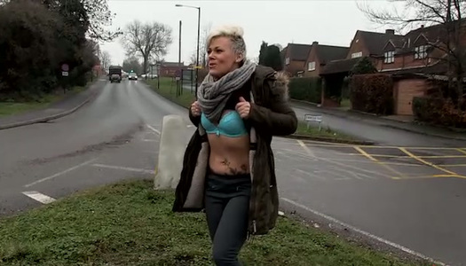 Kinky woman goes to pee in broad daylight porn pics