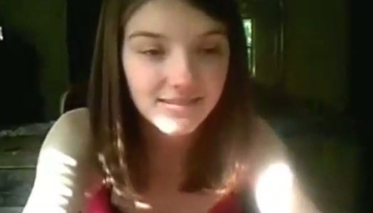 Lovely amateur babe showing her titties and pussy on camera porn pics