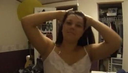 Brunette babe fondling her pussy sensually in amateur solo video porn pics