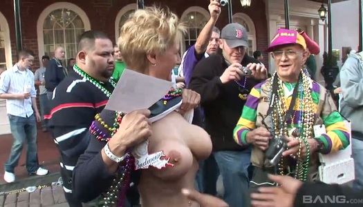 Slutty and shameless chicks show their big tits in the public porn pics