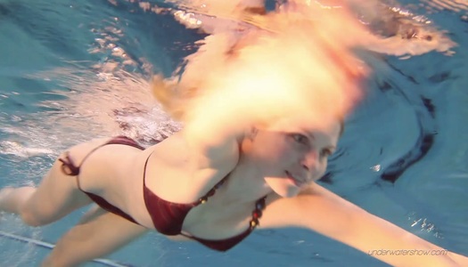 Cute Russian chick Nastya shows striptease under the water porn pics