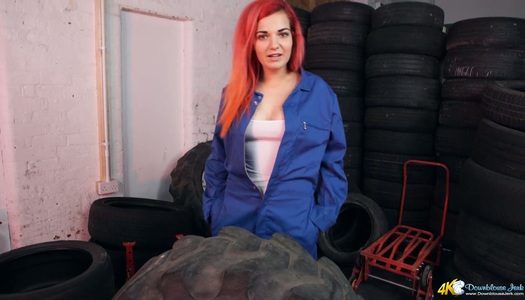 Red haired babe Dolly shows off her ripe and juicy boobies porn pics