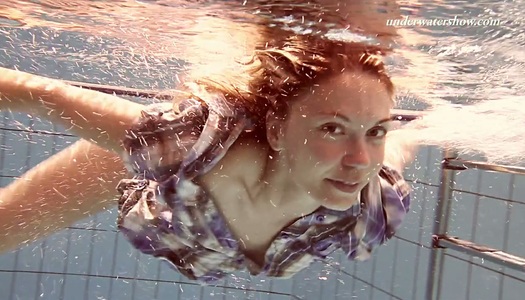 Adorable teen Iva Brizgina shows striptease under the water porn pics