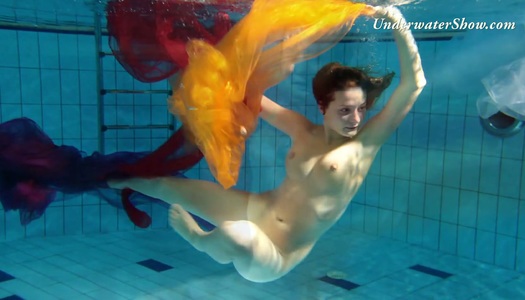 Breath taking underwater show featuring sexy babe in dress porn pics