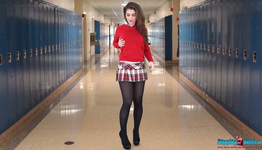 Posh college chick in short skirt Katie Louise is stripping in the hall porn pics