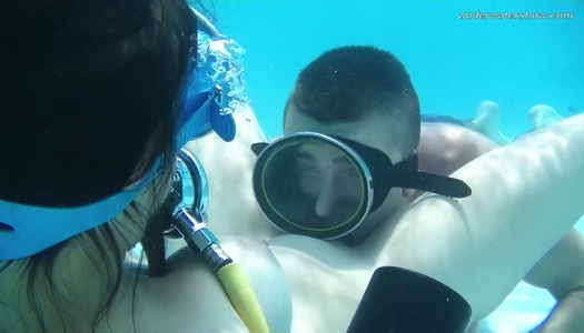 Horny diver is licking plump pussy under the water porn pics