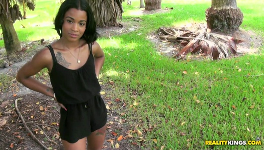 Cute mulatto with a tattooed shower sucks a cock near the tree porn pics