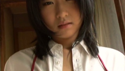 Dirty japanese chick Kira Nanami poses on a cam wearing sexy blue swimsuit porn pics