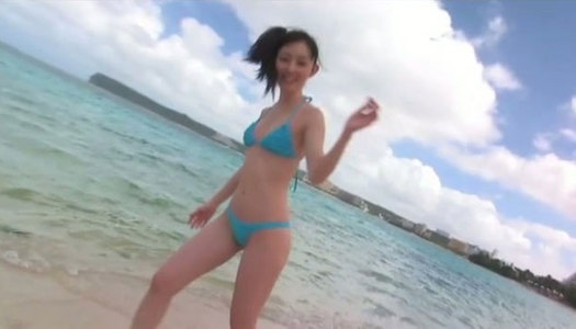 Spunked girlie Rina Akiyama goes to the beach to show her splendid body porn pics