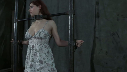 Busty and shy Iona Grace has her hands tied to the posts porn pics