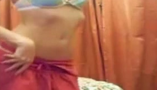 Young blonde in flirty lingerie strips in front of the camera porn pics