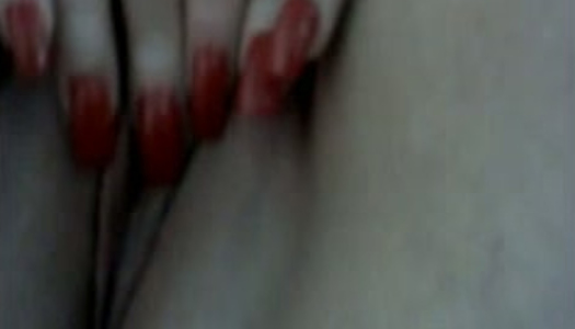Chic with long red nails play with her clit in homemade sex video porn pics