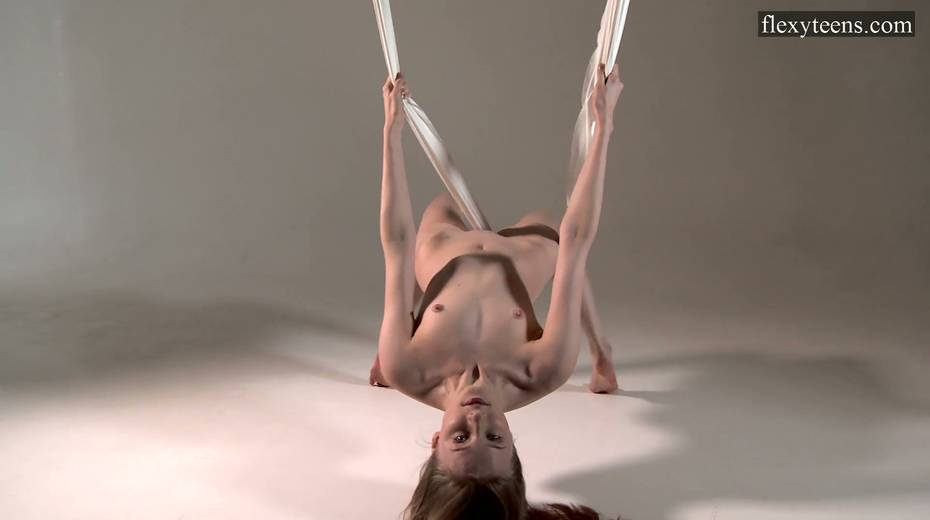 Flexible Russian Gymnast Sofia Zhiraf Gets Naked In The Aerial Hammock